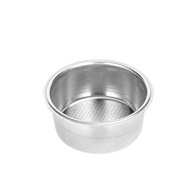 a metal cup sitting on top of a table