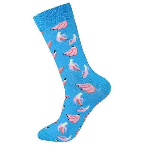 a person holding a snow board in the air