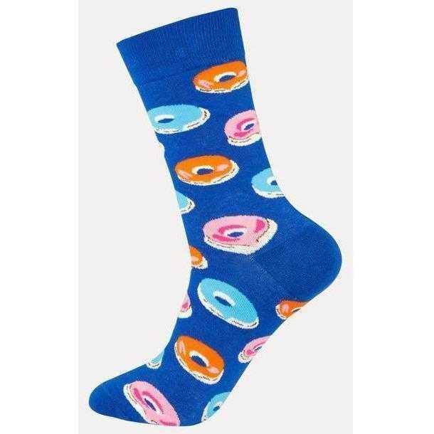 a person is holding a skateboard in their hand