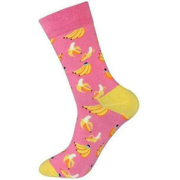 a person on a pink skateboard on a white surface