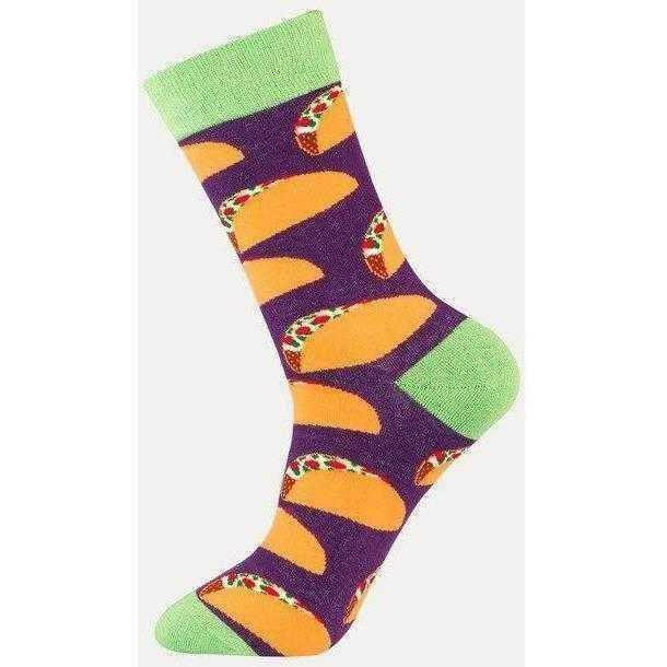 a person wearing a black and yellow striped tie