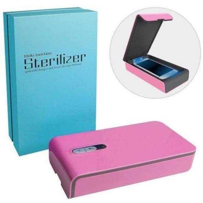 a pink cell phone sitting on top of a table