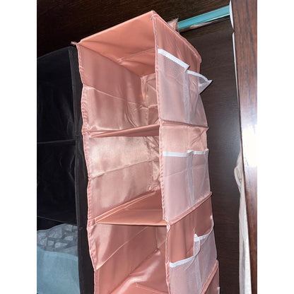 Multi-Layer Hanging Storage Bag Wardrobe Clothes Organizer . Garment organizer.
