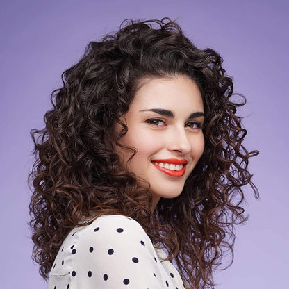 a woman with a hair dryer on her head 