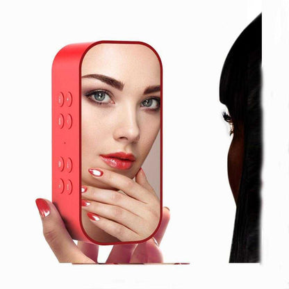 a woman holding a cell phone in her hand 
