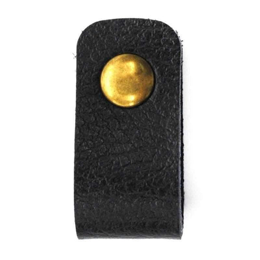 a close up of a clock on a table