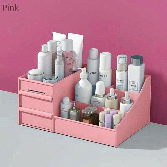 a pink box filled with lots of items