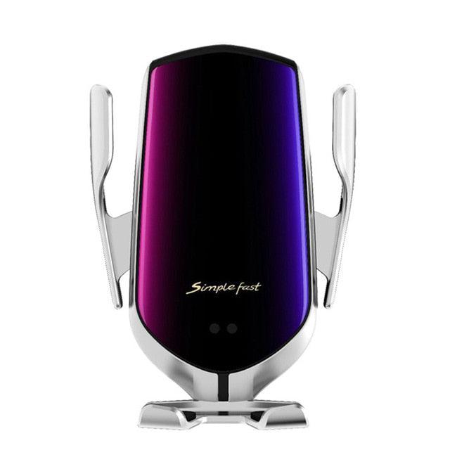 a purple cell phone sitting on top of a table 