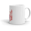 a coffee cup sitting next to a coffee cup 