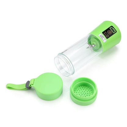 a green and white toothbrush sitting on a table 