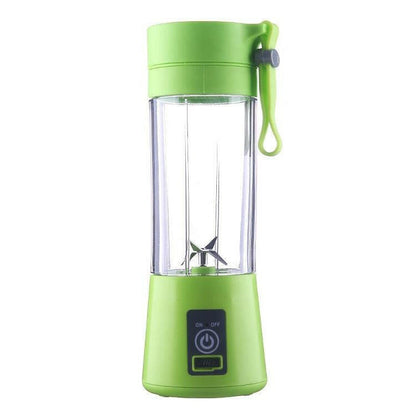 a green cup with a green liquid in it 
