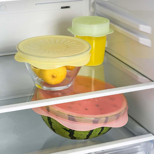 a blender filled with yellow liquid on a shelf