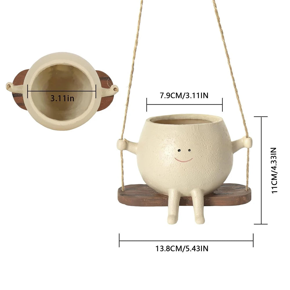 Size diagram of the swing face planter: 13.8 cm wide, 11 cm tall, 7.9 cm opening, and a 3.11 inch interior