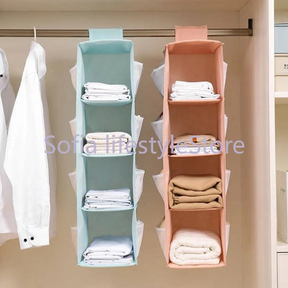 Multi-Layer Hanging Storage Bag Wardrobe Clothes Organizer . Garment organizer.