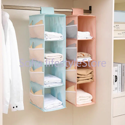 Multi-Layer Hanging Storage Bag Wardrobe Clothes Organizer . Garment organizer.