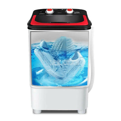 a plastic container filled with a blue and white toaster 