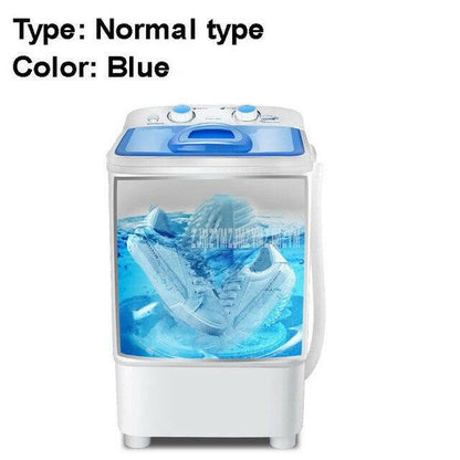 a blue and white blender sitting on a counter 