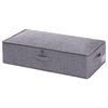 a black piece of luggage sitting on top of a box 