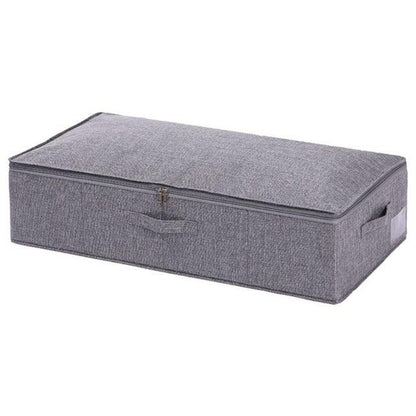 a black piece of luggage sitting on top of a box 
