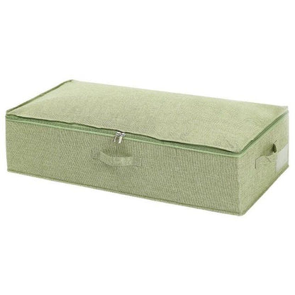 a green piece of luggage sitting on a table 