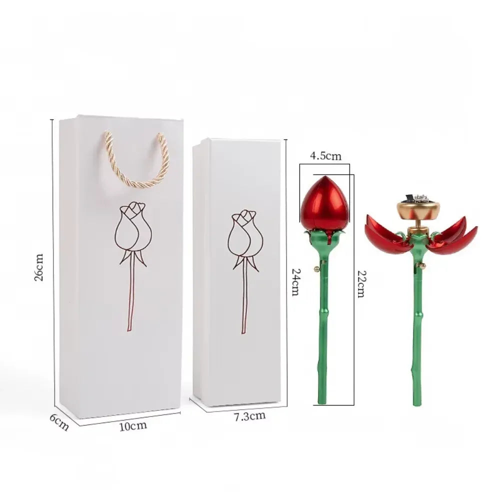 Size diagram of the red rose jewelry box: 26 cm tall gift bag, 24 cm long gift box, 22 to 24 cm stem, and a 4.5 cm bud, with the opened rose holding a ring