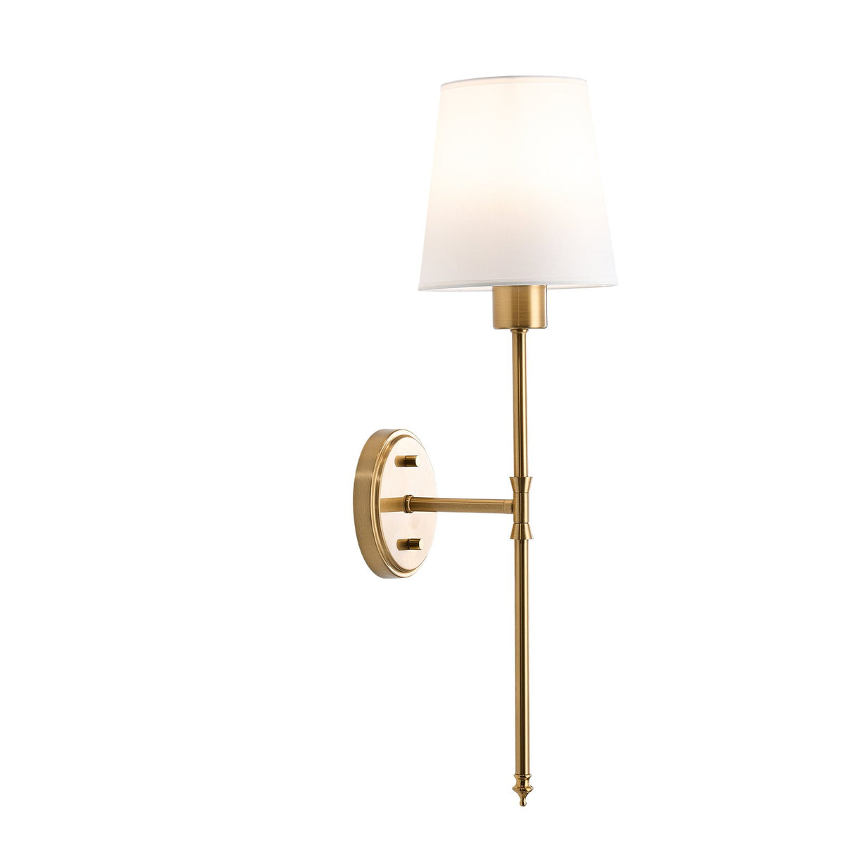 Gold wall sconce with a white shade, viewed from the opposite side