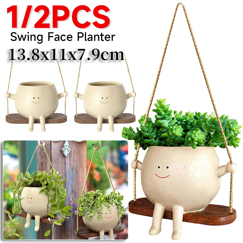Swing face planter set with 1 or 2 pieces shown hanging with succulents, labeled 13.8 by 11 by 7.9 cm